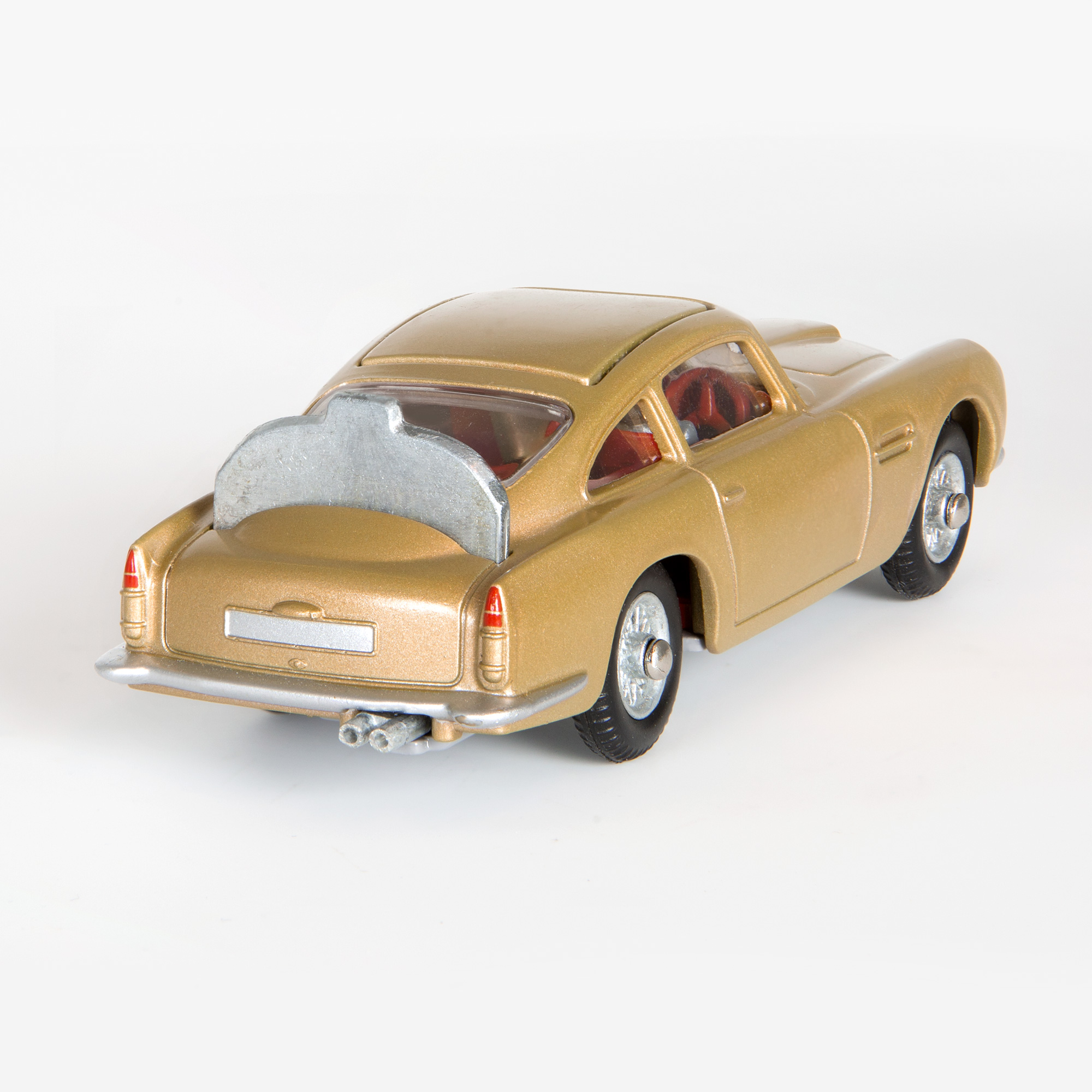 CORGI TOYS : Aston Martin DB5, modèle James Bond, couleur or métallisé, avec son co CORGI TOYS : Aston Martin DB5, modèle James Bond, couleur or métallisé, avec son co