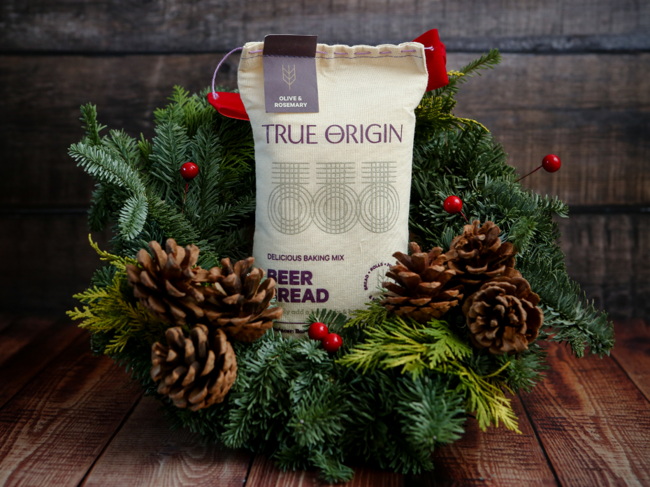 True Origin Olive and Rosemary Beer Bread in a Christmas Wreath.