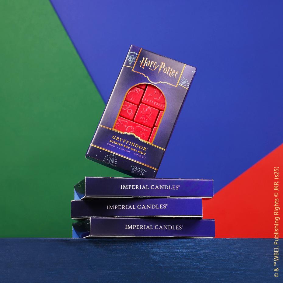 Gryffindor&trade;  Wax Melt stacked on a few others showcasing side design.