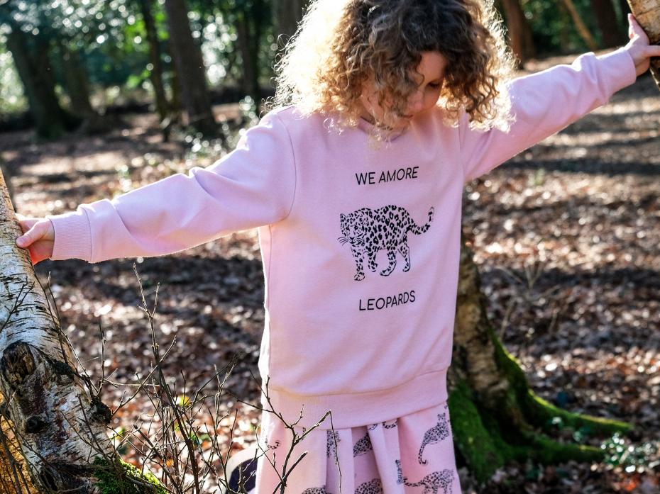 sweat and dress in hand-drawn print of the oh-so-handsome Amur leopard lets your little wild-one get up close to the magic of nature.