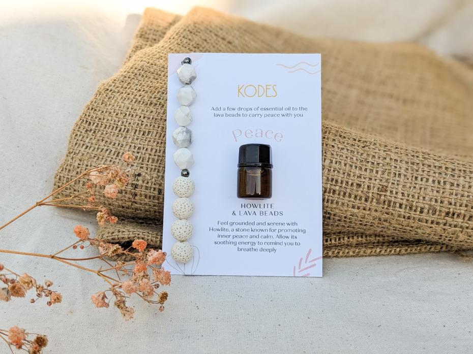 Peace - Howlite & Lava Aromatherapy Essential Oil Bracelet with esstial oil complementary sample on backing card