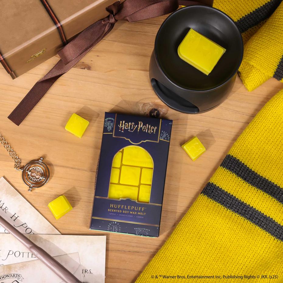 Hufflepuff&trade; Wax Melt showing easy to snap segments ready to use in a wax burner.