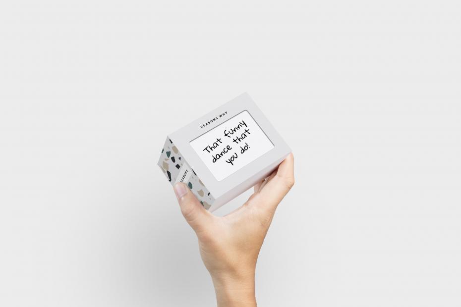 Hand Holding Pikkii 101 Reasons Why Box