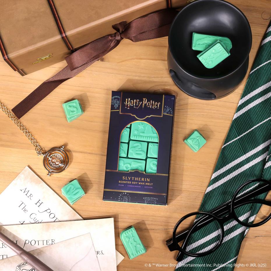 Slytherin&trade; Wax Melt showing easy to snap segments ready to use in a wax burner.