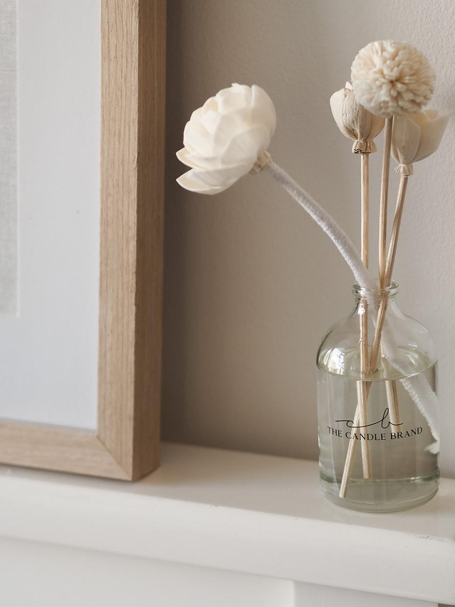 Flowers in the branded vase.