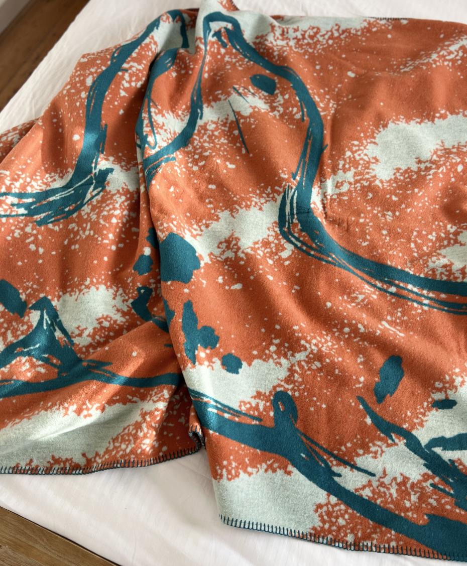 Seal Love being used as a bed throw.