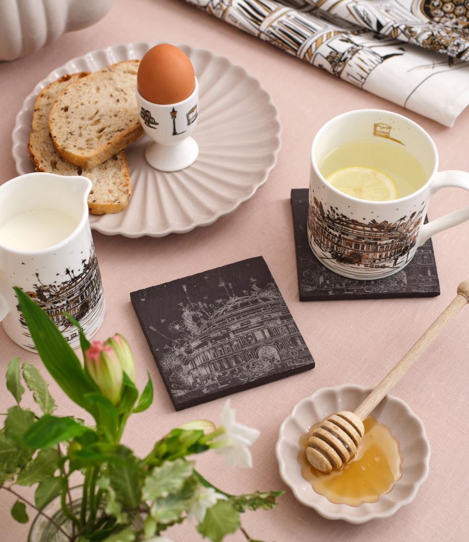 Slate coasters with accompanying products in the collection