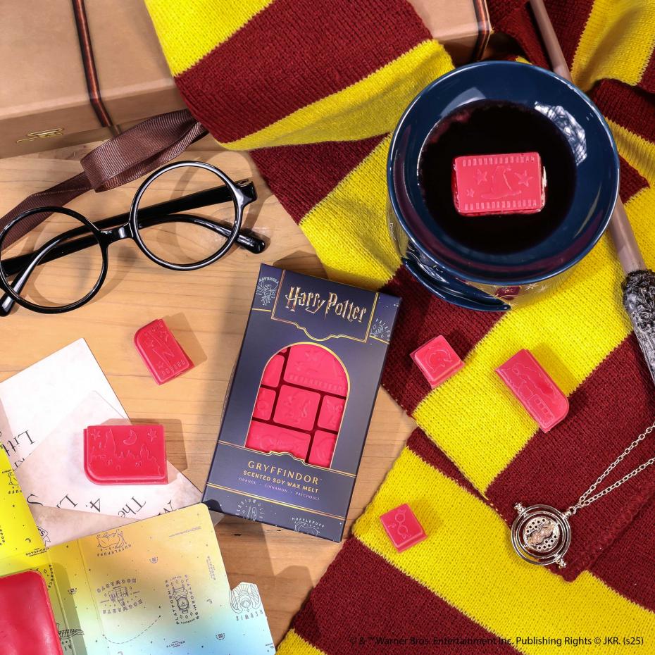 Gryffindor&trade; Wax Melt showing easy to snap segments ready to use in a wax burner.