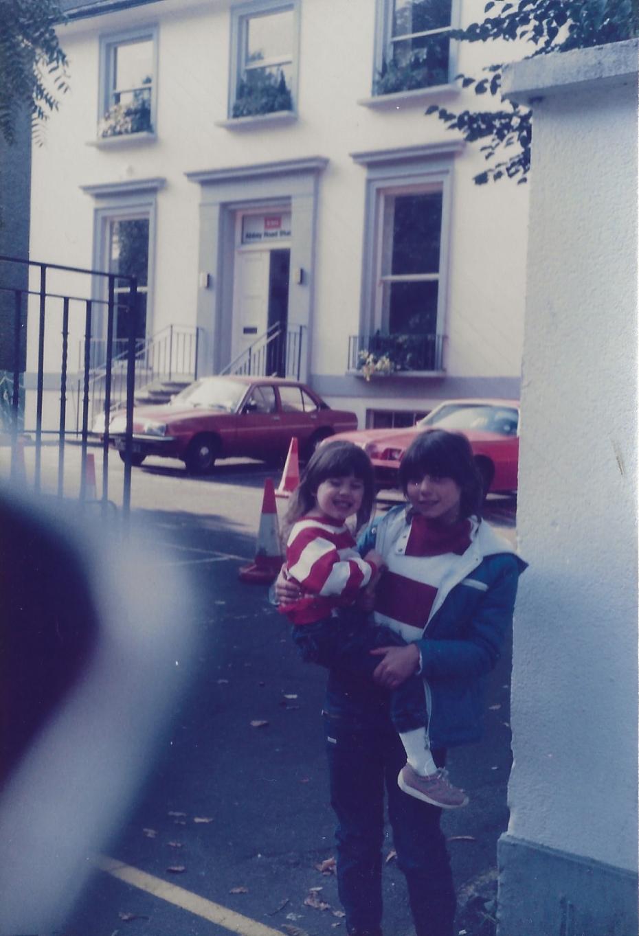 Victoria Eggs being held aged 4 years old in front of Abbey Road Studios