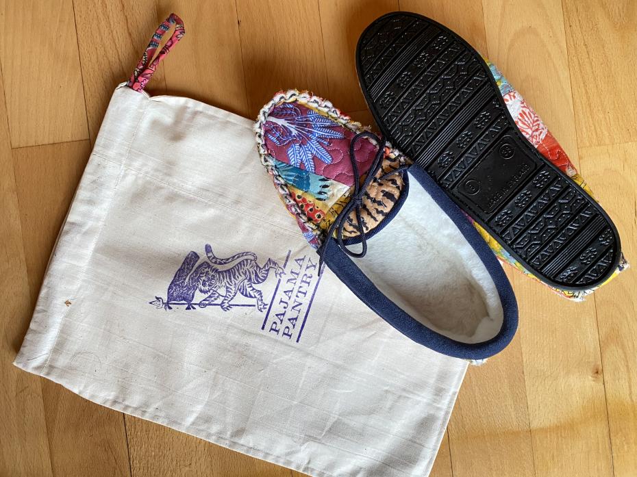 Each pair of slippers has a PVC sole, made in the UK, and comes in a branded shoe bag. Even the bags are made from offcuts, some are more colourful than others!
