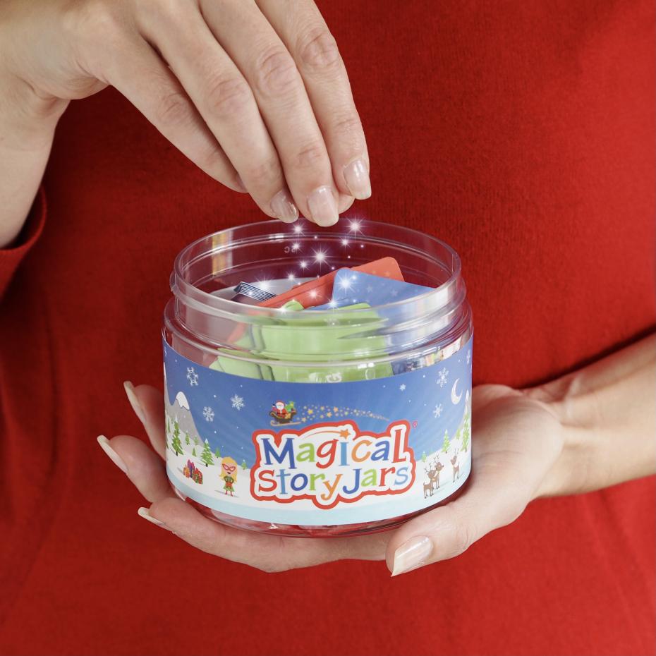 Magic dust being sprinkled over the story cards of the Christmas Magical Story Jar to make the stories come alive